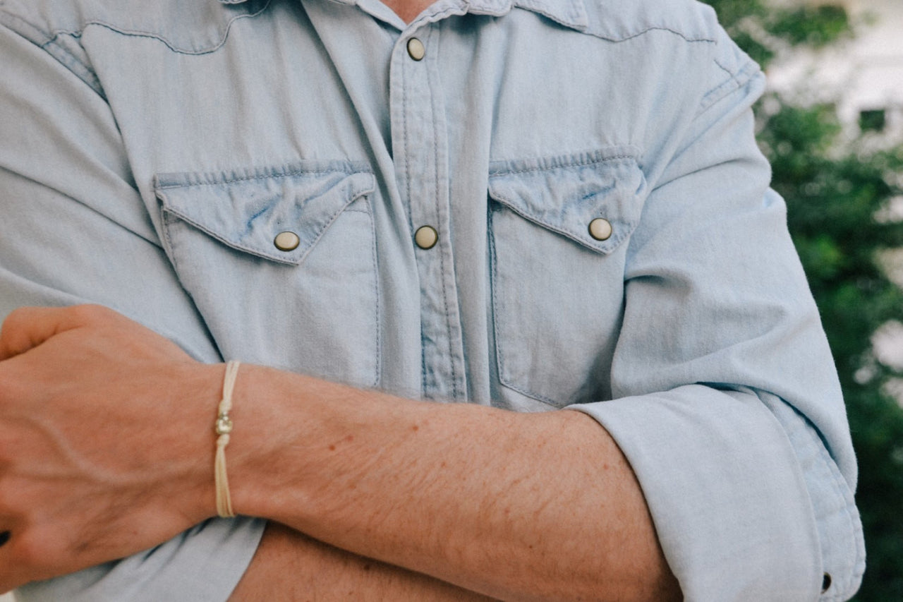 Silver skull bracelet for men, beige cord - shani-adi-jewerly
