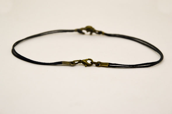 Men's anklet with a bronze Ohm - shani-adi-jewerly