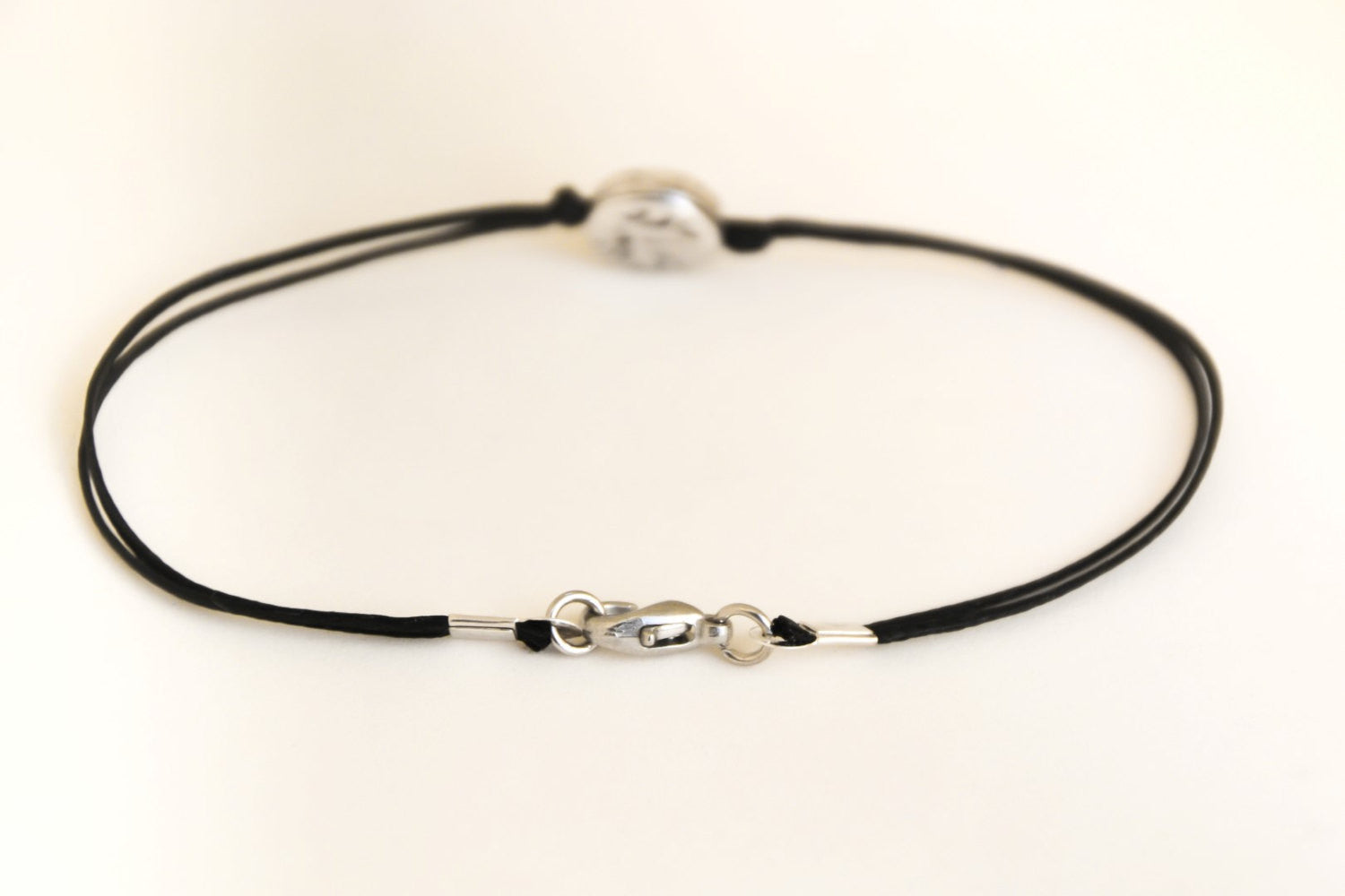 Silver round charm bracelet for men, black cord - shani-adi-jewerly