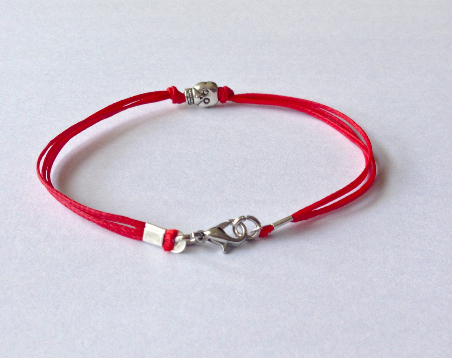 Skull bracelet for men, red cord - shani-adi-jewerly