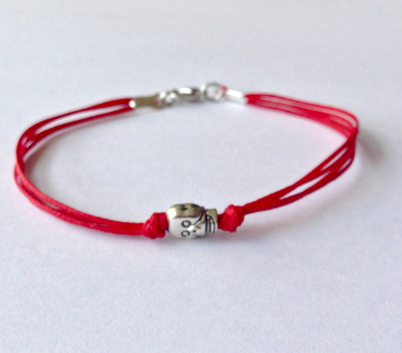 Skull bracelet for men, red cord - shani-adi-jewerly
