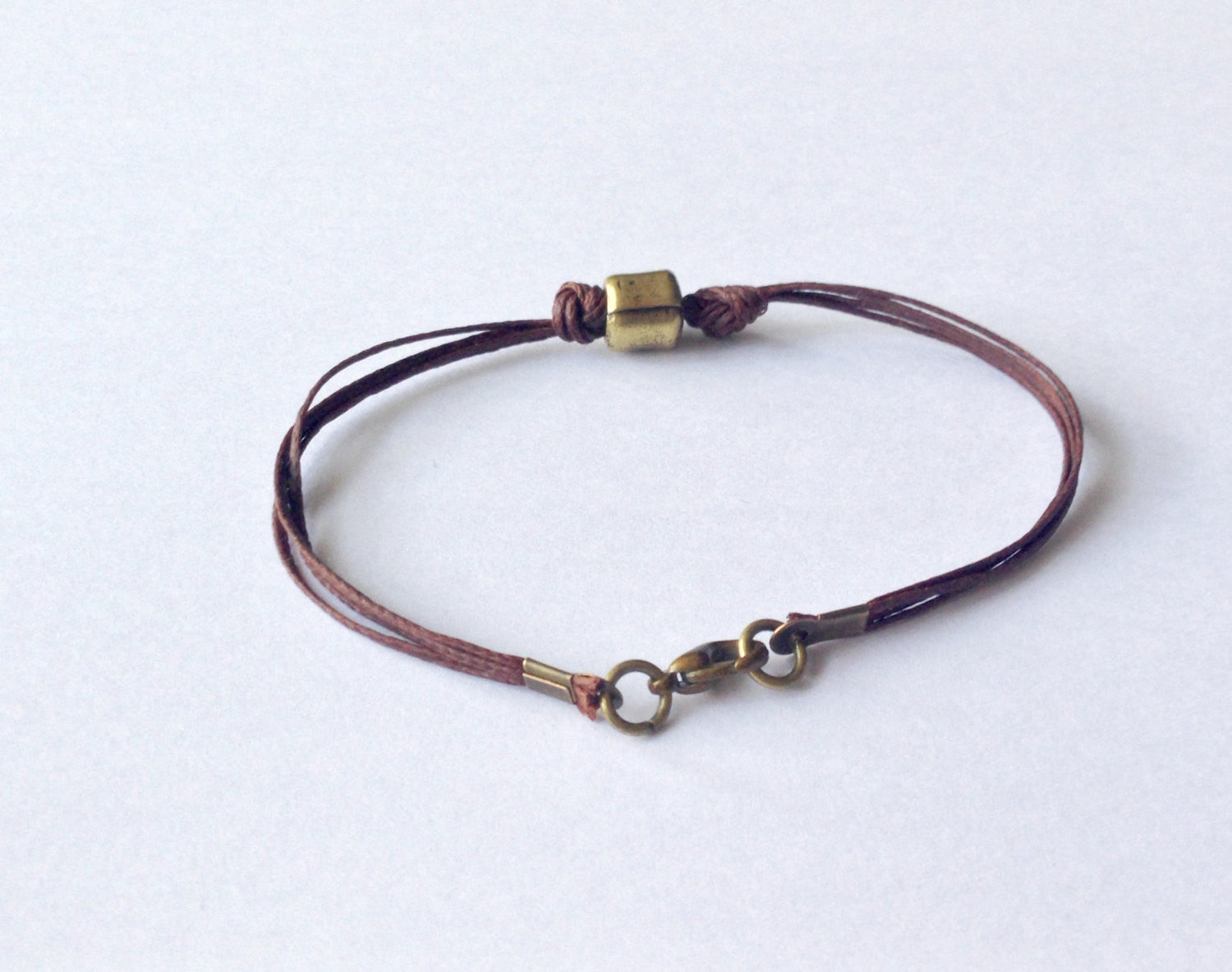 Bronze tube bracelet for men, brown cord - shani-adi-jewerly