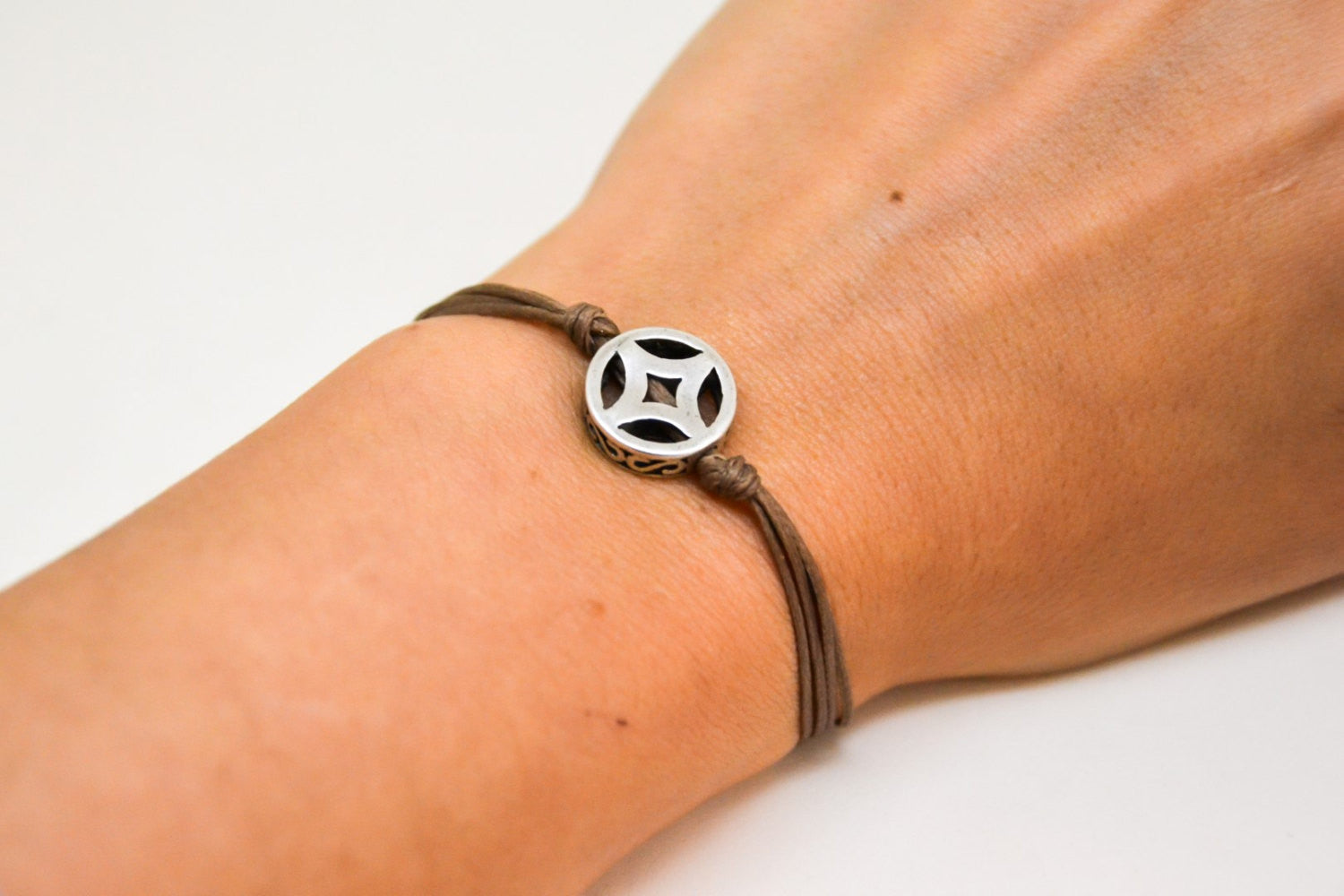 Brown cord bracelet with decorated silver circle bead charm - shani-adi-jewerly
