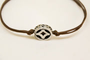 Brown cord bracelet with decorated silver circle bead charm - shani-adi-jewerly
