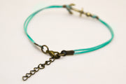 Cord bracelet with a bronze anchor charm, turquoise string - shani-adi-jewerly