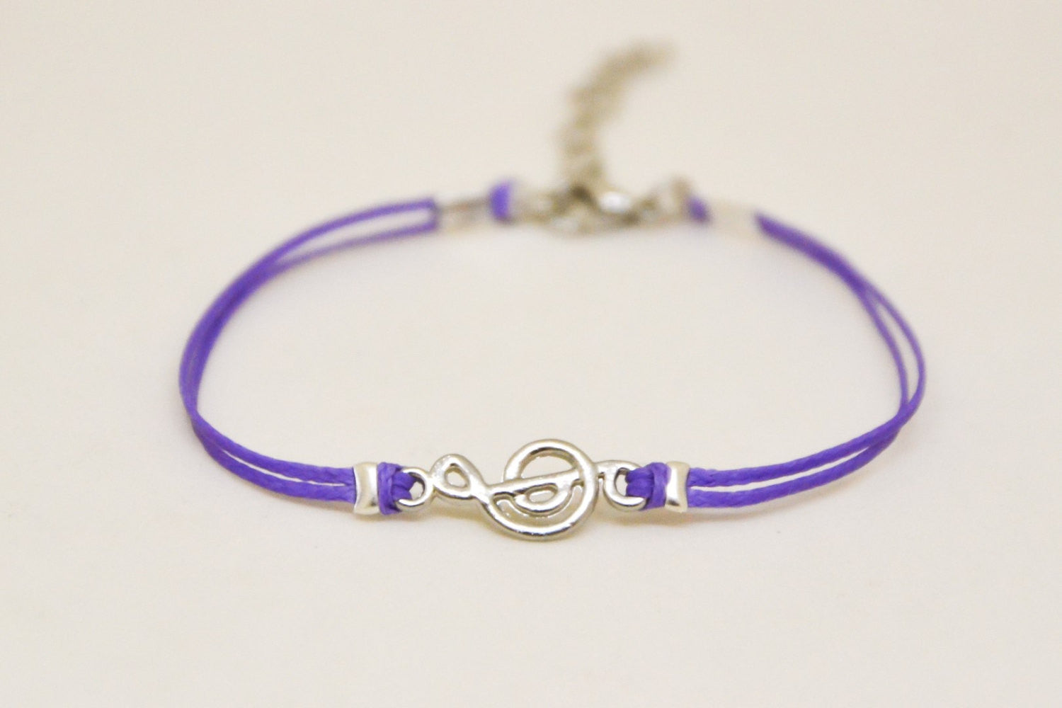 Purple cord bracelet with a silver Treble clef charm - shani-adi-jewerly