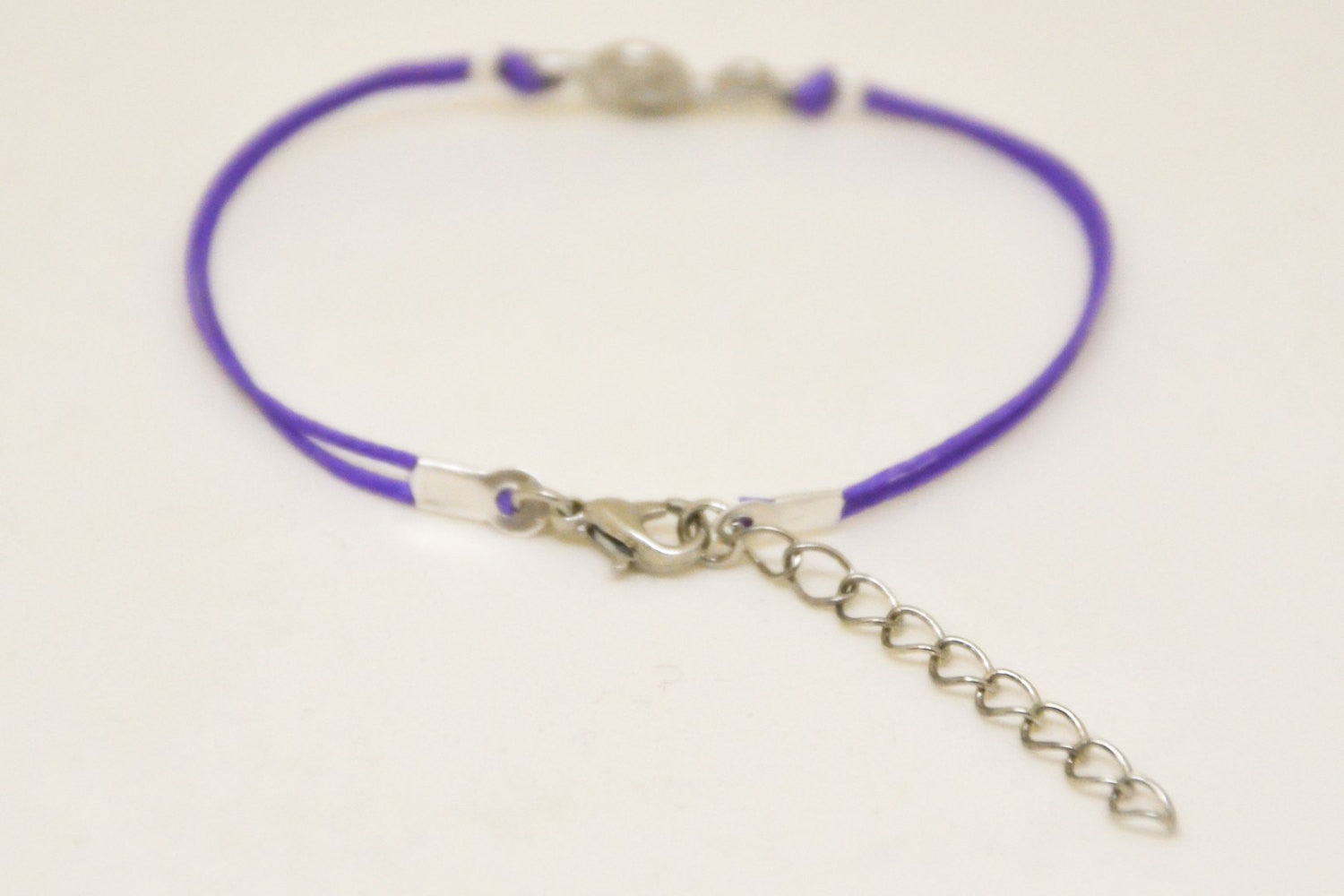 Purple cord bracelet with a silver Treble clef charm - shani-adi-jewerly