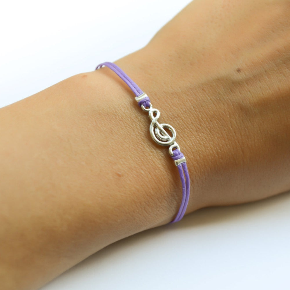 Purple cord bracelet with a silver Treble clef charm - shani-adi-jewerly
