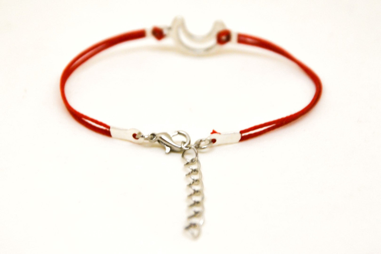 Red cord bracelet with a silver crescent moon charm - shani-adi-jewerly