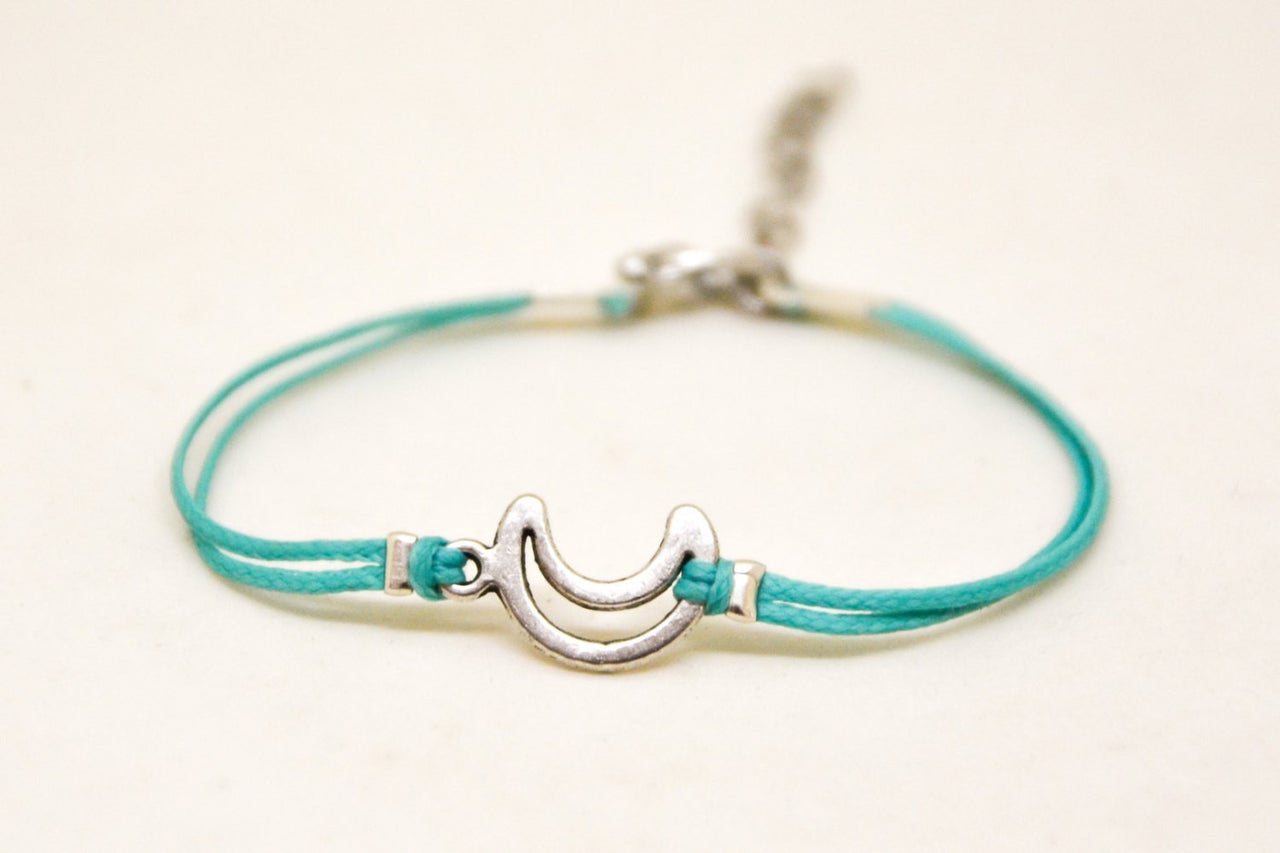 Turquoise cord bracelet with a silver crescent moon charm - shani-adi-jewerly