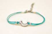 Turquoise cord bracelet with a silver crescent moon charm - shani-adi-jewerly