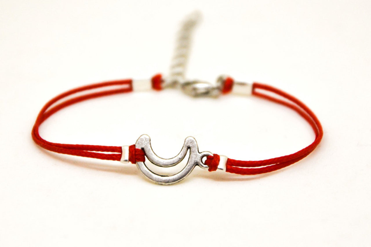 Red cord bracelet with a silver crescent moon charm - shani-adi-jewerly