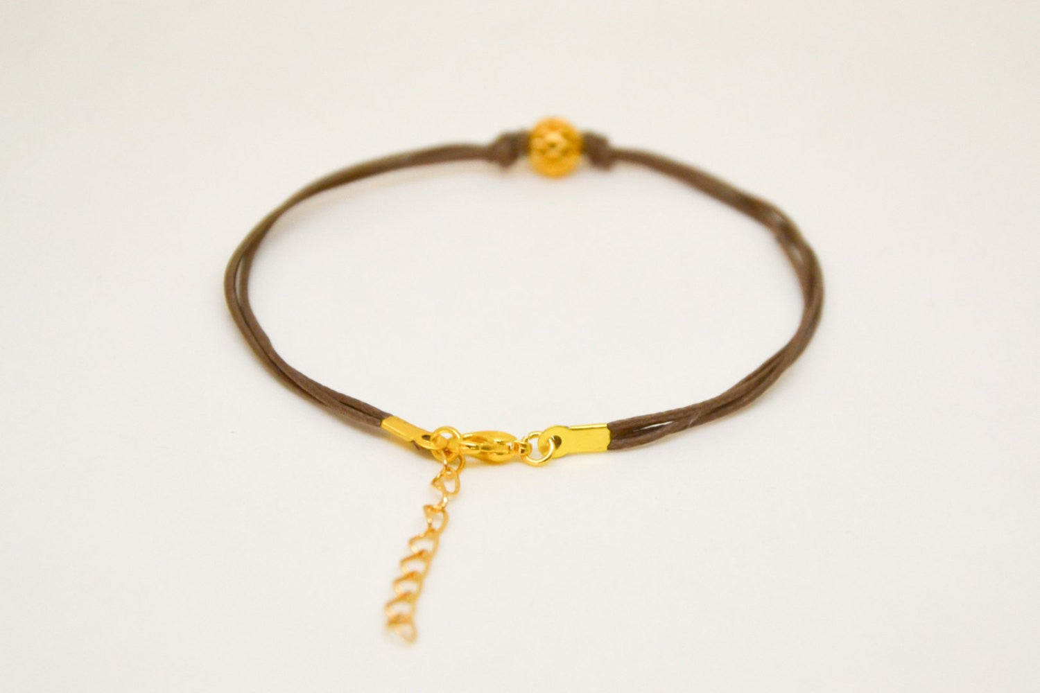 Brown cord bracelet with gold bead - shani-adi-jewerly