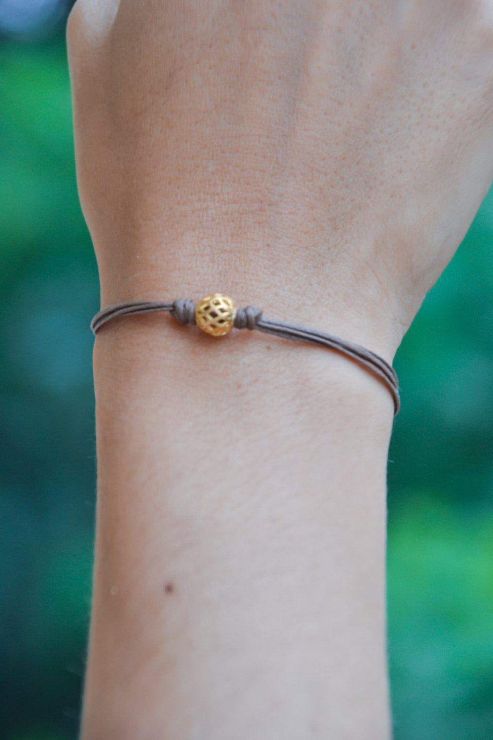 Gold ball bracelet, brown cord - shani-adi-jewerly