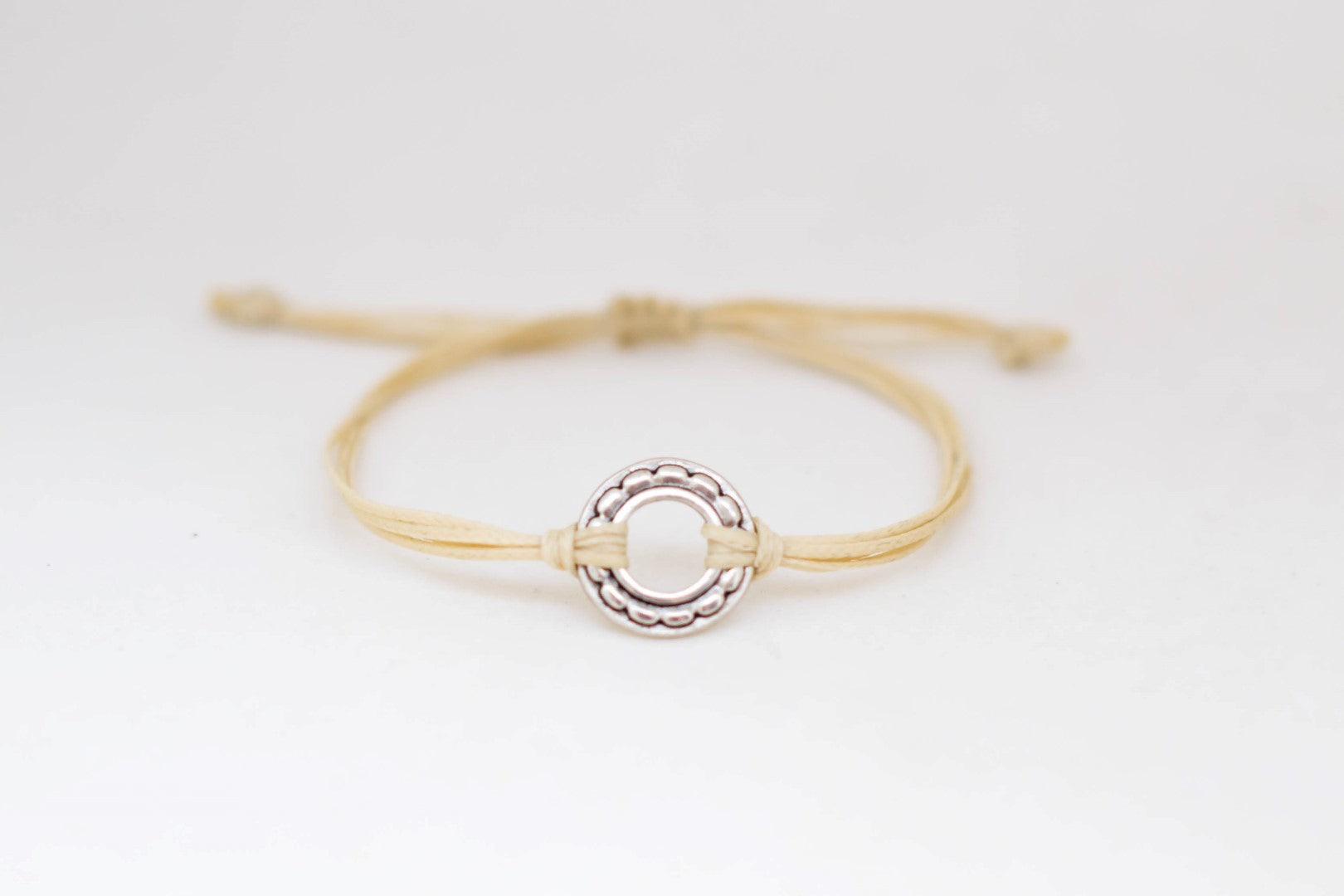 Adjustable silver karma circle bracelet for men, beige cord, yoga jewelry - shani-adi-jewerly
