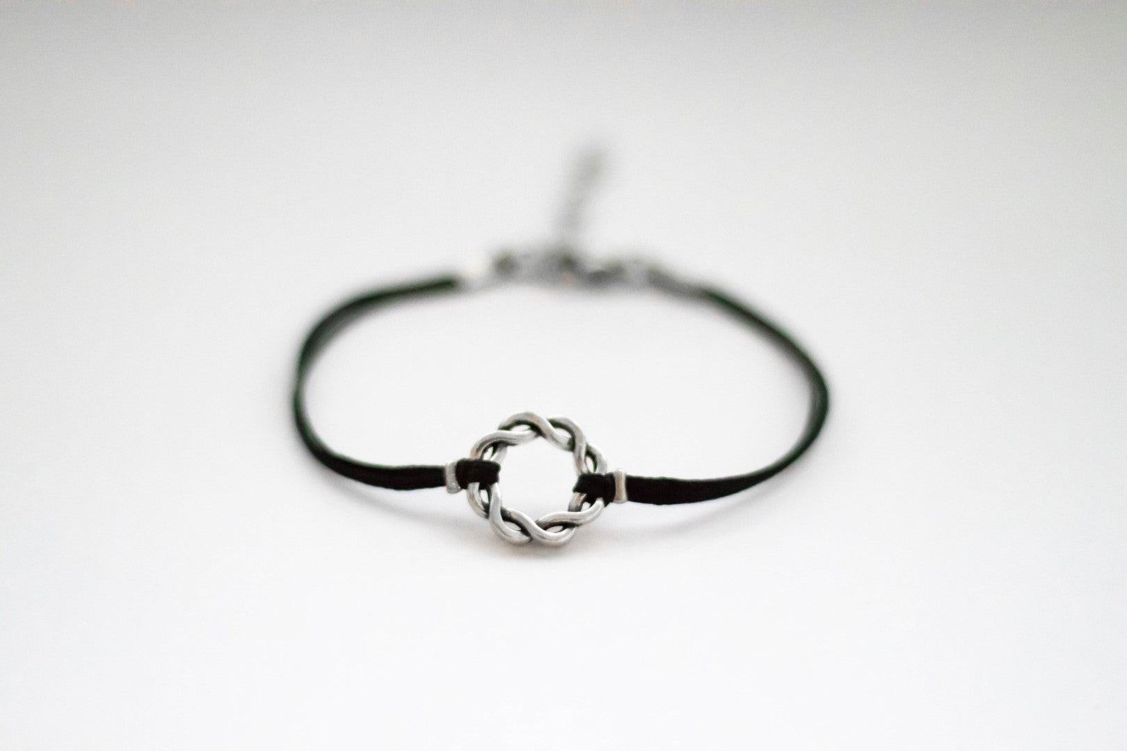 Karma bracelet, silver braided circle charm and black string, yoga jewelry - shani-adi-jewerly