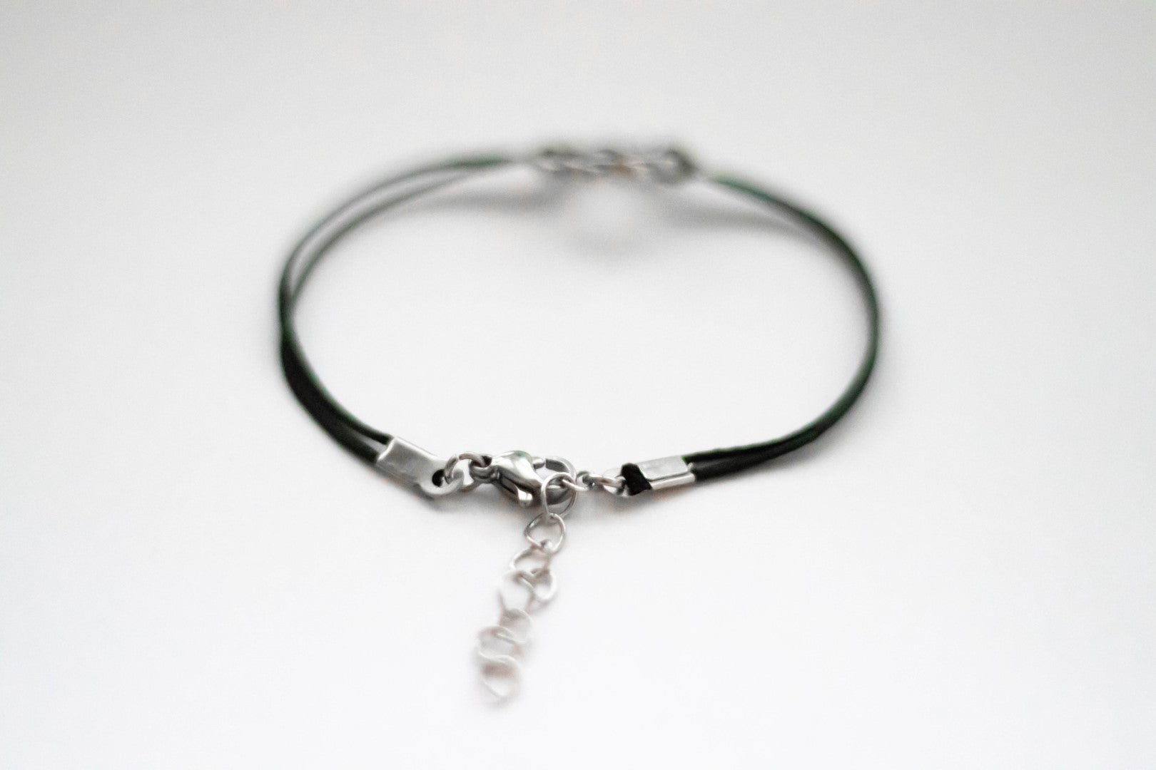 Karma bracelet, silver braided circle charm and black string, yoga jewelry - shani-adi-jewerly