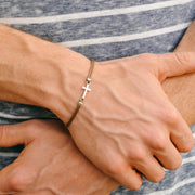 Men's bracelet with a silver cross charm, brown cord - shani-adi-jewerly