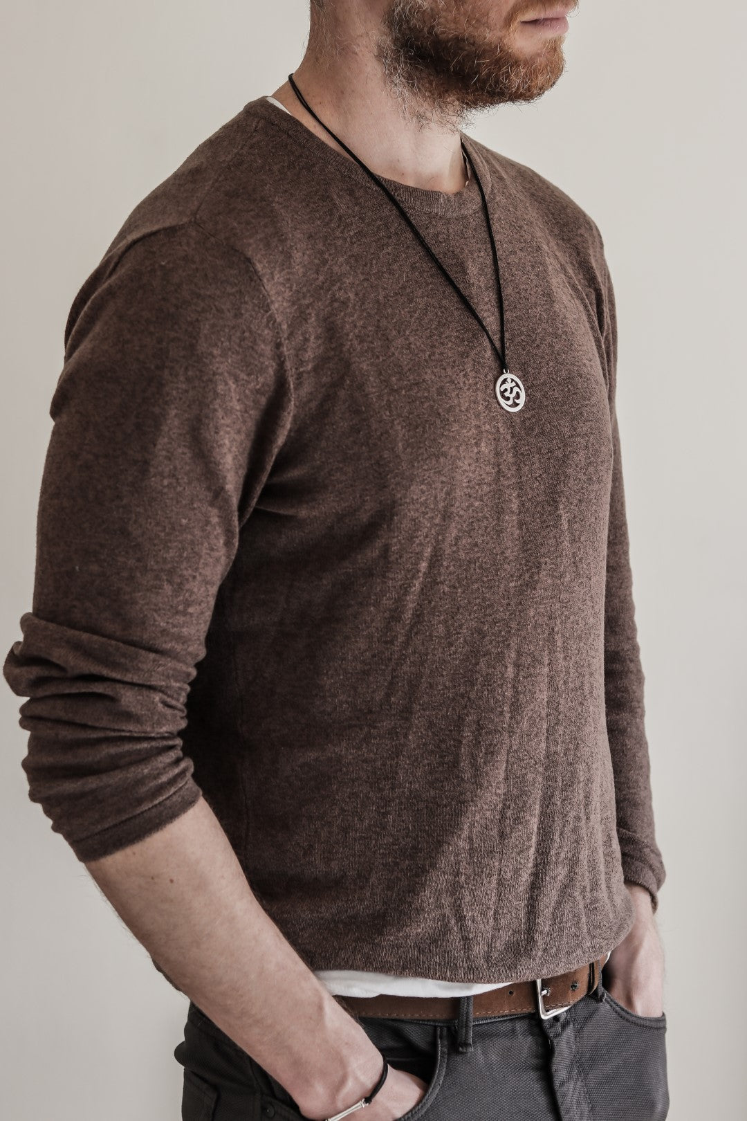 Men's necklace with a silver Om pendant, black cord - shani-adi-jewerly