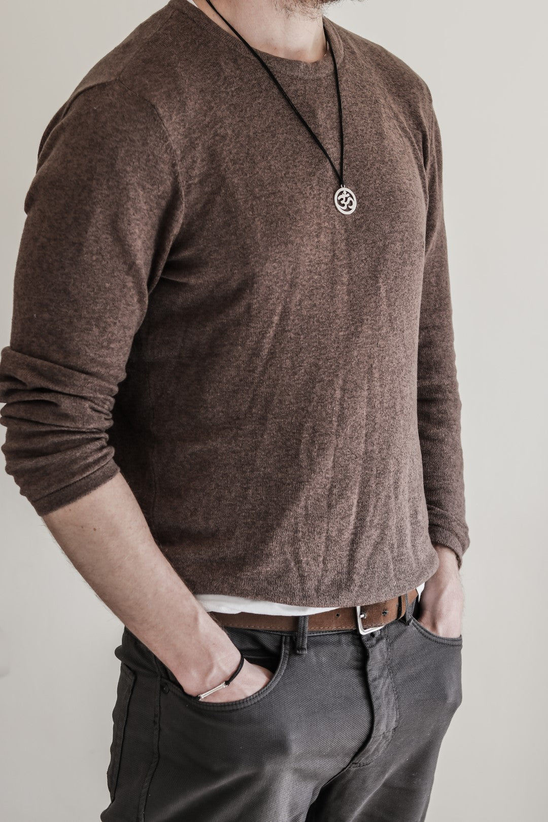 Men's necklace with a silver Om pendant, black cord - shani-adi-jewerly