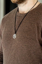 Men's necklace with a silver Om pendant, black cord - shani-adi-jewerly