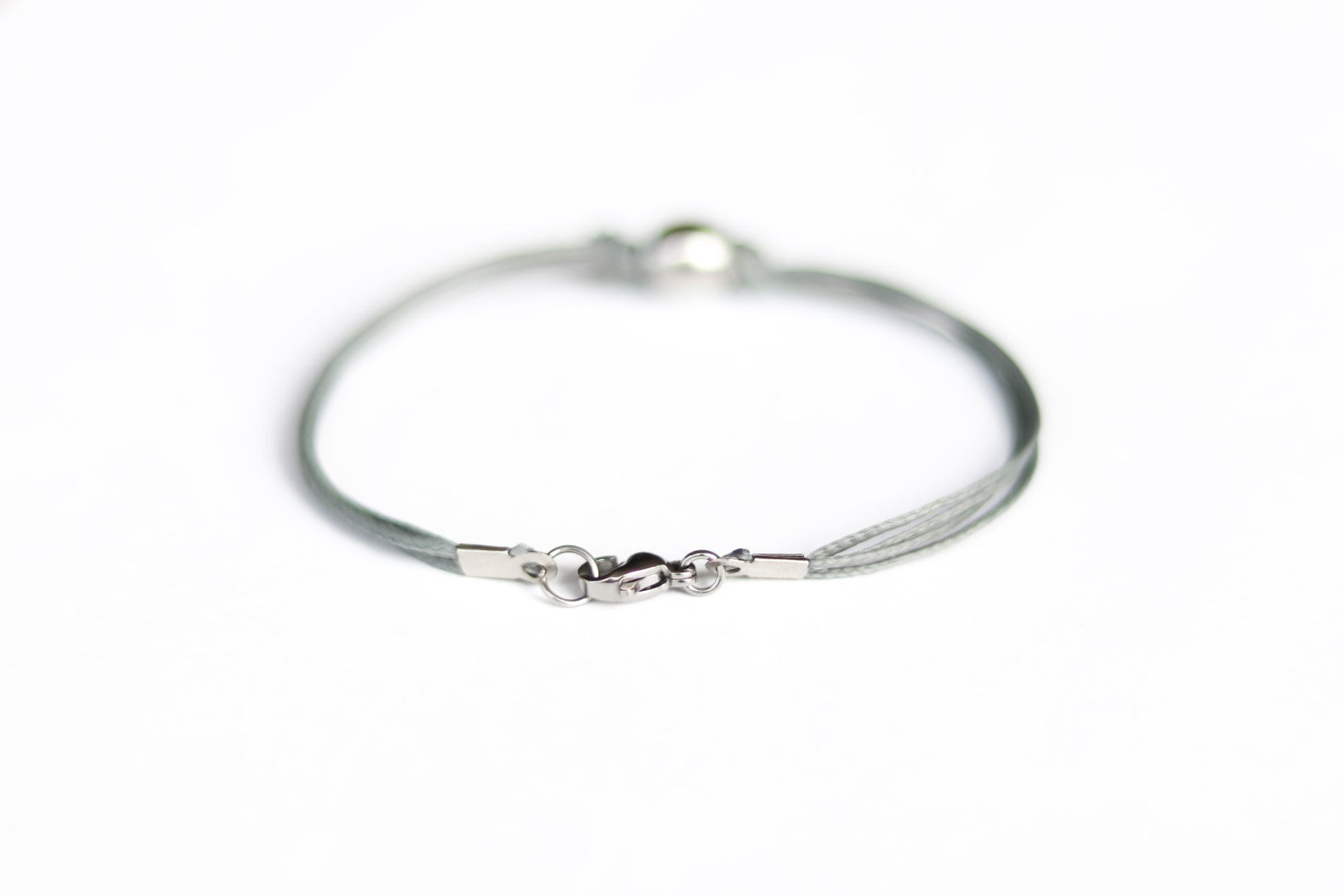 Men's bracelet with silver bead charm and a gray cord - shani-adi-jewerly