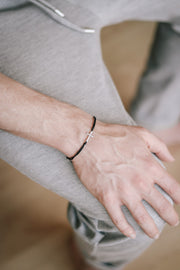 handmade silver cross bracelet for men, black cord - shani and adi jewelry
