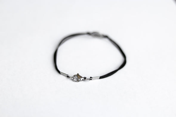 handmade silver om bracelet for men, black cord - shani and adi jewelry