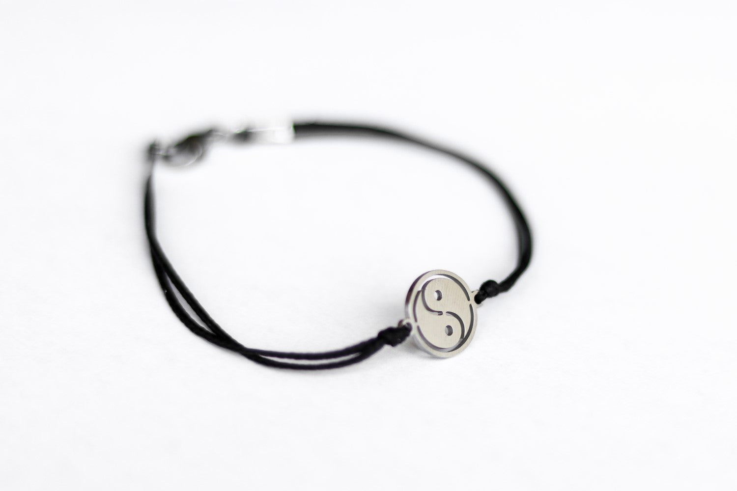 handmade silver yin and yang bracelet for women, black cord - shani and adi jewelry