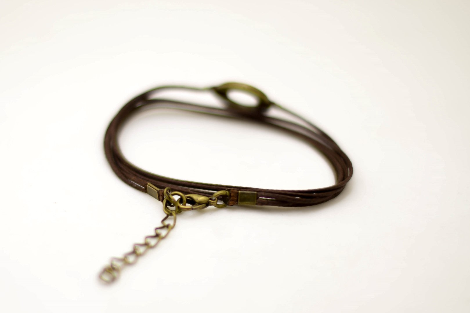 Wrapped believe bracelet, bronze charm, brown cord, mothers day gift - shani-adi-jewerly